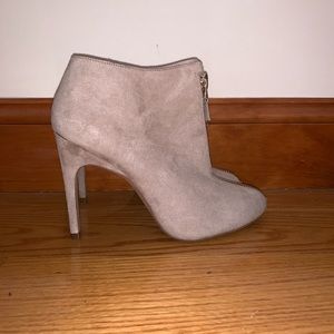 Heeled zip up booties